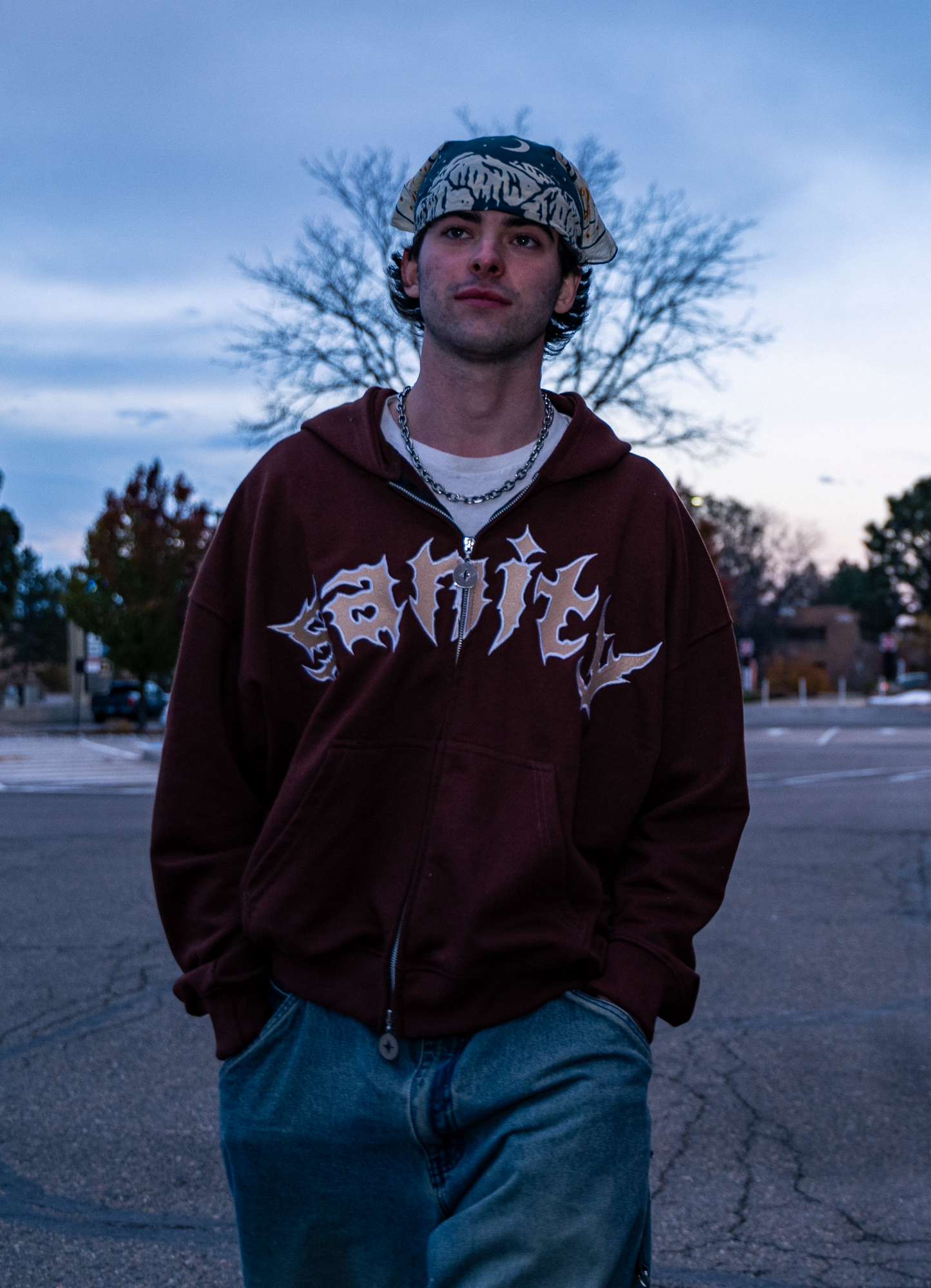 Model wearing mocha zip-up hoodie, size XL fit demonstration