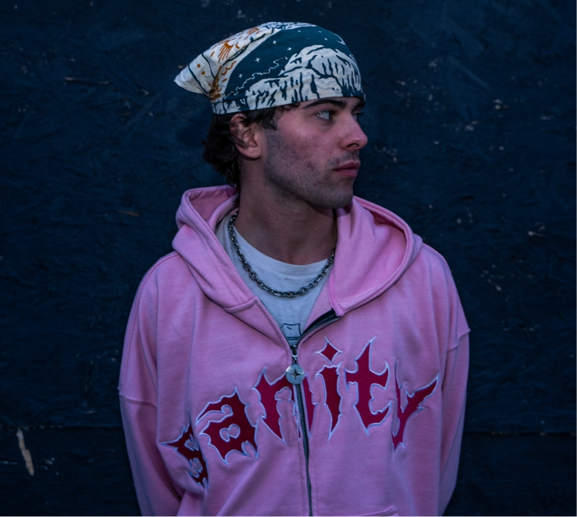 Model wearing rose zip-up hoodie, size XL fit demonstration