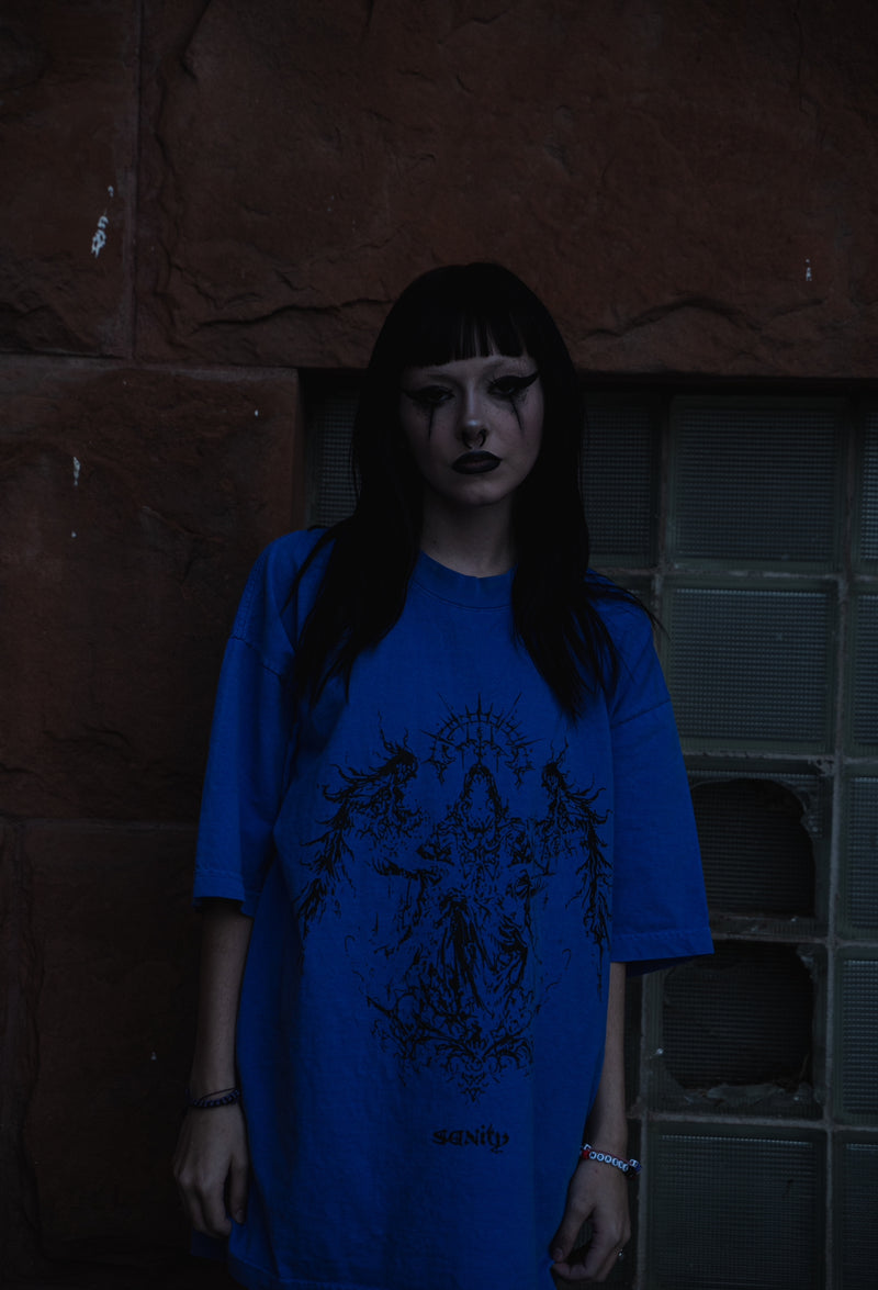 Model wearing purple Spirits t-shirt, size XL fit demonstration